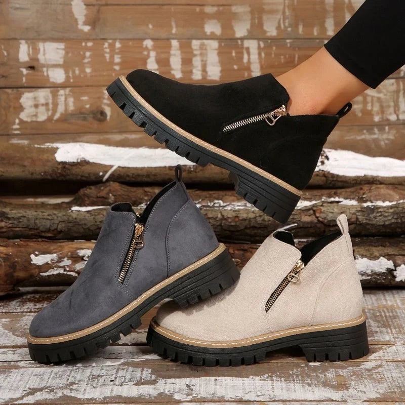 Women's side zip ankle boots with lug sole