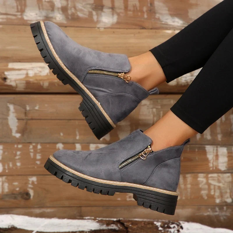 Women's side zip ankle boots with lug sole