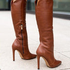 Women's over-the-knee pointed-toe boots with very high stiletto heels
