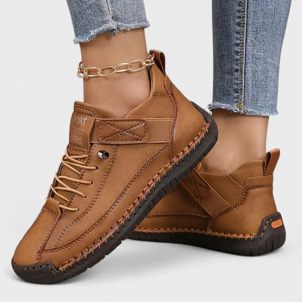 Women's lace-up casual sneakers with ankle strap, stitched panels and textured sole
