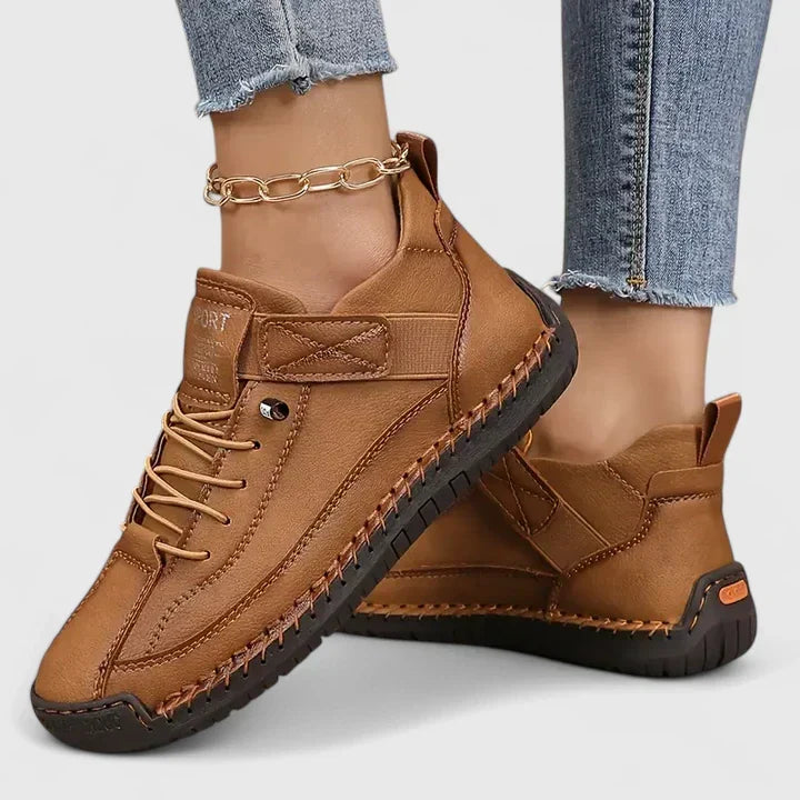 Women's strap sneakers with lace-up fronts and stitched soles