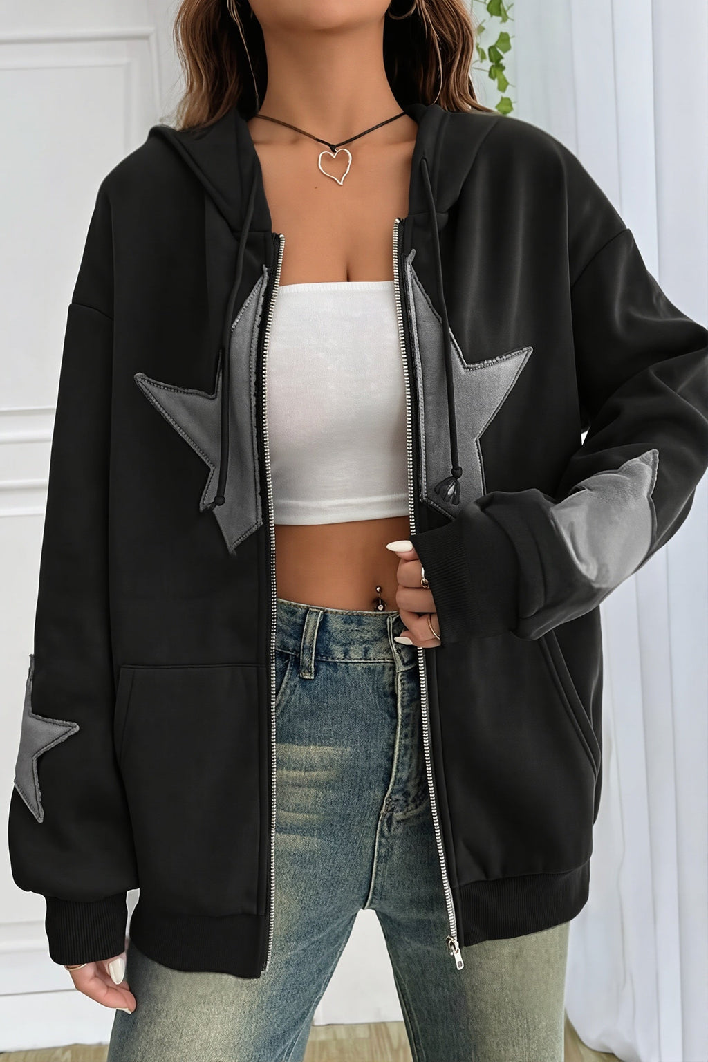 Women's oversized zip hoodie with contrasting star appliques, hood and kangaroo pockets