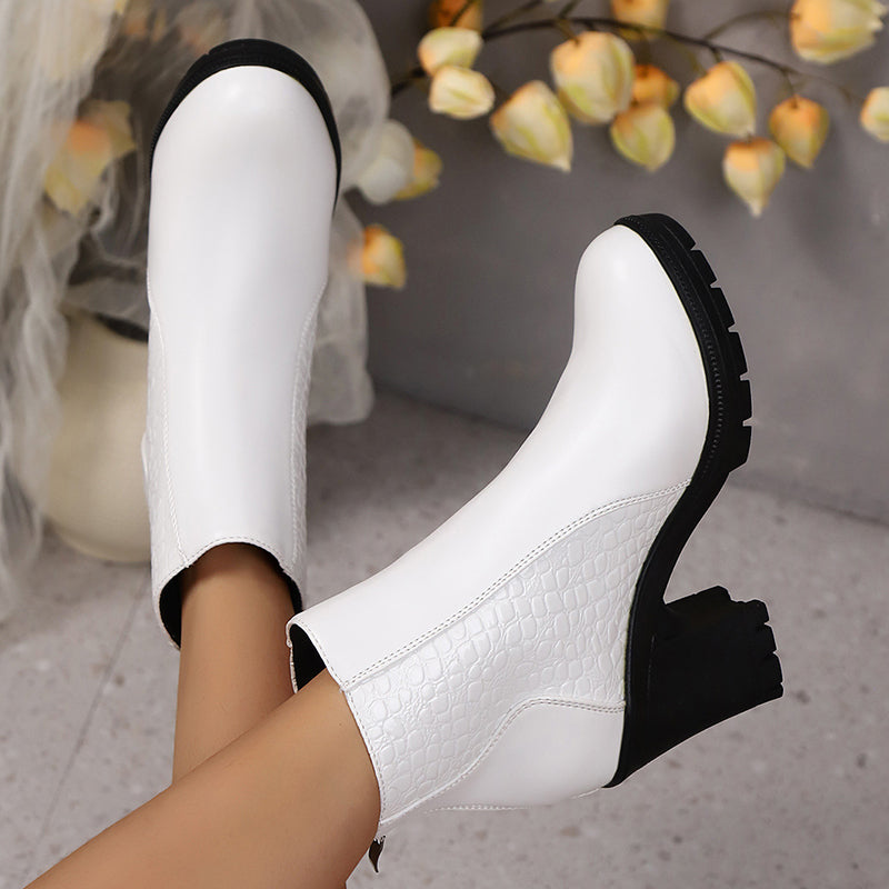 Women's ankle boots with textured panels, high block heels, side zips and lugged soles