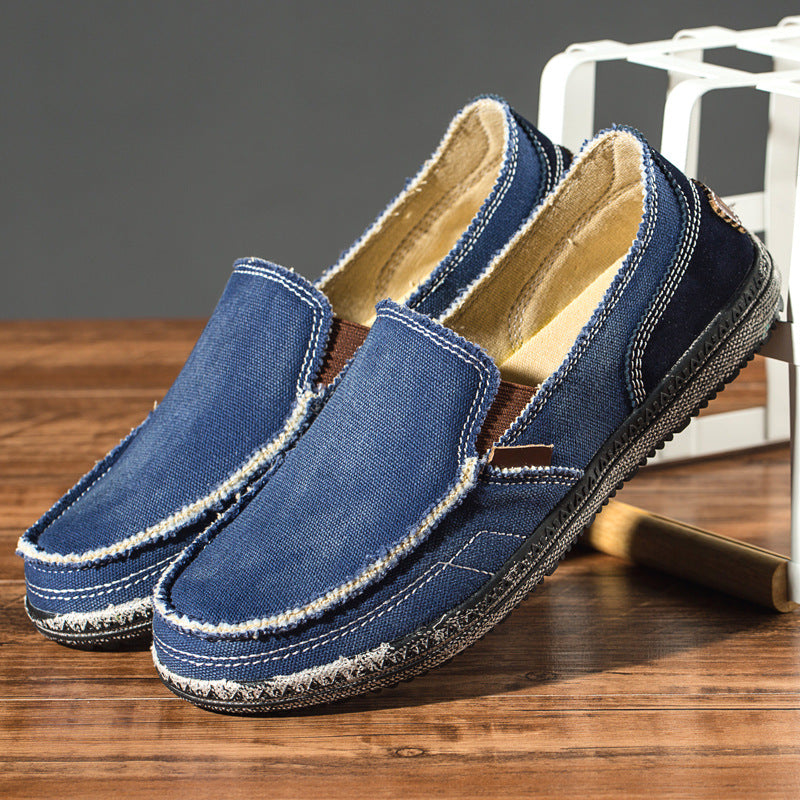 Unisex canvas loafer with moc toe, contrast stitching and flat sole