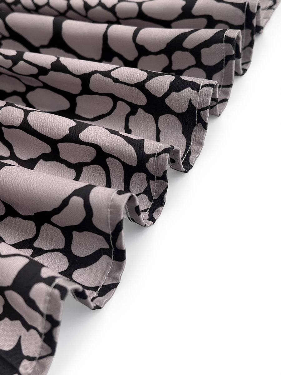 Women's grey and black snakeskin print blouse with lapel collar and long sleeves