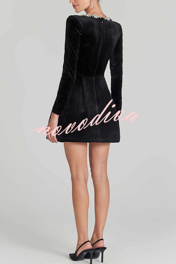 Women's velvet mini dress with embellished square neckline, long sleeves and flared skirt