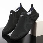 Knit barefoot-style slip-on shoes with textured panels and pull tabs