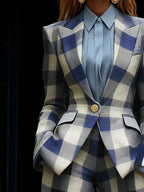 Women's blue checked blazer with notched collar, long sleeves and flap pockets
