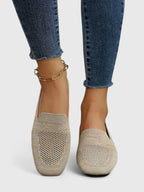 Women's textured round-toe slip-on flats with flat soles