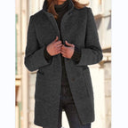 Women's button front coat with raised collar, long sleeves and front pockets