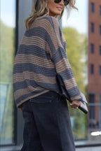 Women's striped open-knit sweater with crew neckline and long sleeves