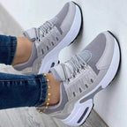Women's lace-up sneakers with panelled uppers and platform soles