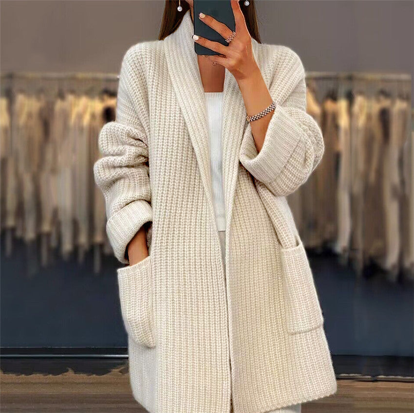 Women's textured open front longline cardigan with long sleeves and patch pockets