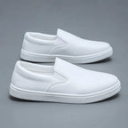 Men's slip-on loafers with rounded toes and contrasting white soles