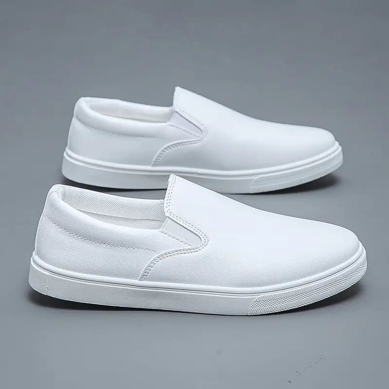 Men's slip-on loafers with rounded toes and contrasting white soles