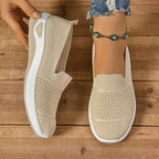 Women's knit slip-on sneakers with textured panels and white soles