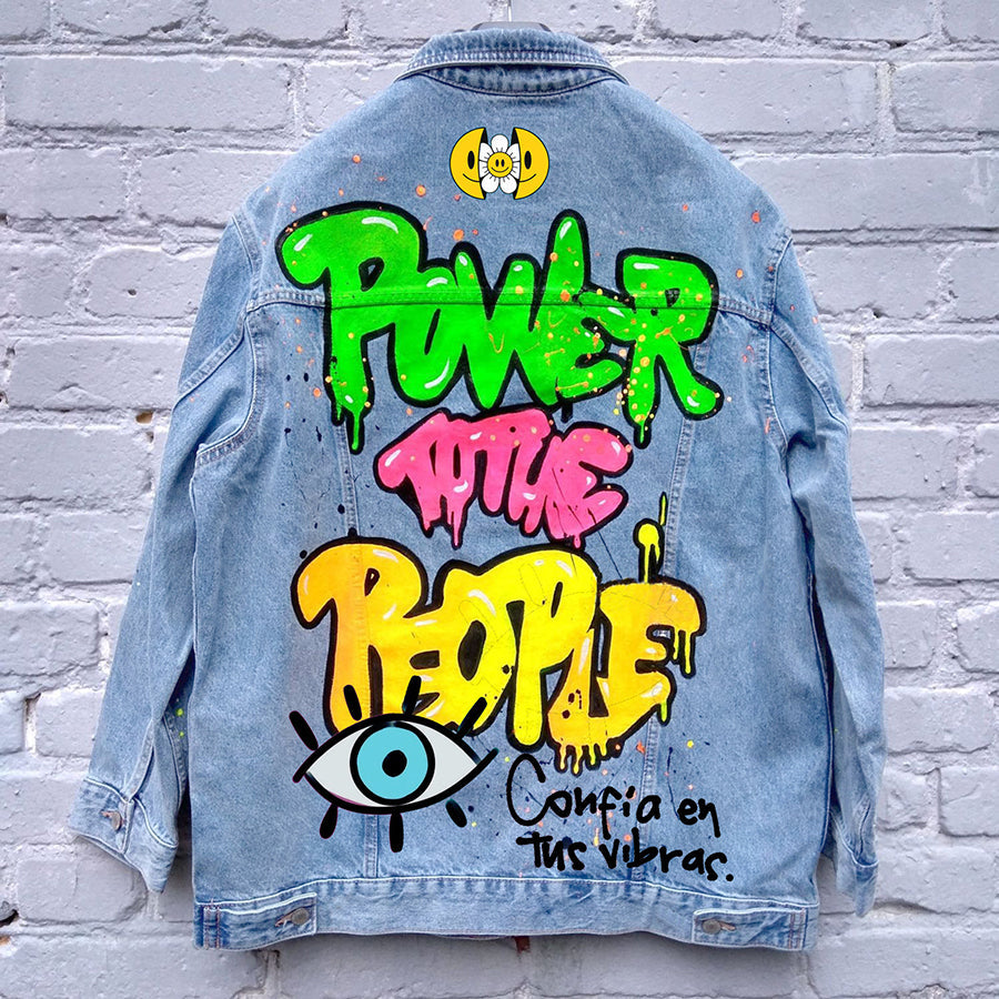 Graphic denim jacket with colourful Halloween-style artwork on the back