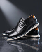 Wingtip brogue trainers with perforated panels and layered soles