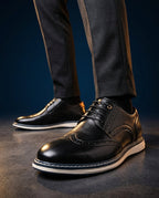 Wingtip brogue trainers with perforated panels and layered soles