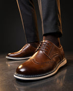 Wingtip brogue trainers with perforated panels and layered soles
