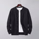 Men's textured button cardigan with crew neck, long sleeves and two front pockets