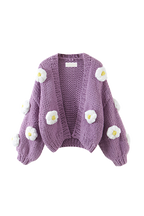 Women's chunky knit cardigan with white flower appliques and puff sleeves