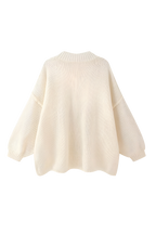 Women's oversized knit cardigan with crew neck and button front