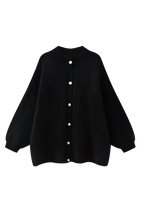 Women's oversized knit cardigan with crew neck and button front