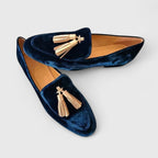 Women's deep blue almond-toe loafers with gold-tone tassel trim