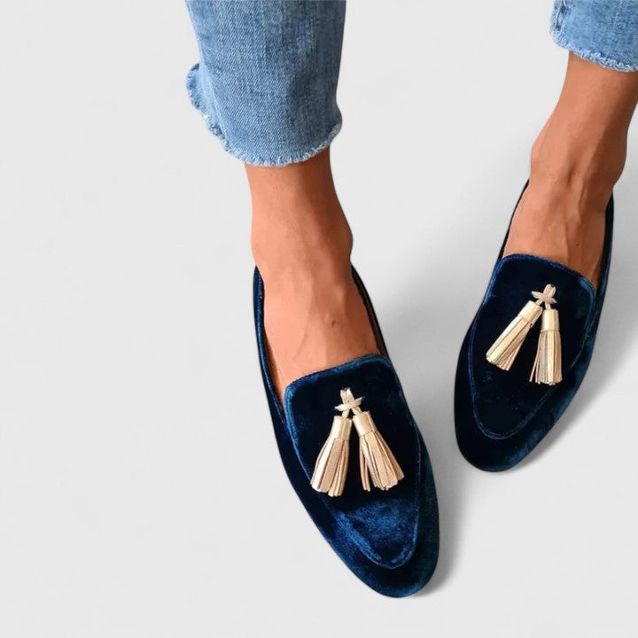 Women's deep blue almond-toe loafers with gold-tone tassel trim