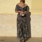 Women's floral wrap maxi dress with V-neckline and ruched waist