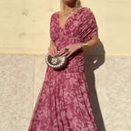 Women's floral wrap maxi dress with V-neckline and ruched waist