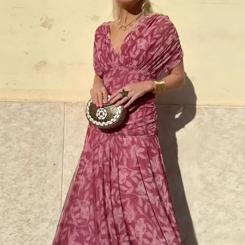 Women's floral wrap maxi dress with V-neckline and ruched waist