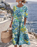 Women's multicolour floral print midi dress with round neck and 3/4 sleeves