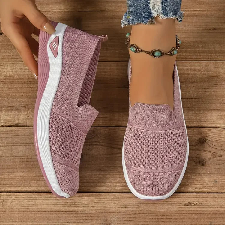 Women's knit slip-on sneakers with textured panels and white soles
