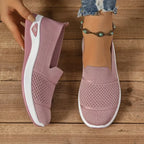 Women's knit slip-on sneakers with textured panels and white soles
