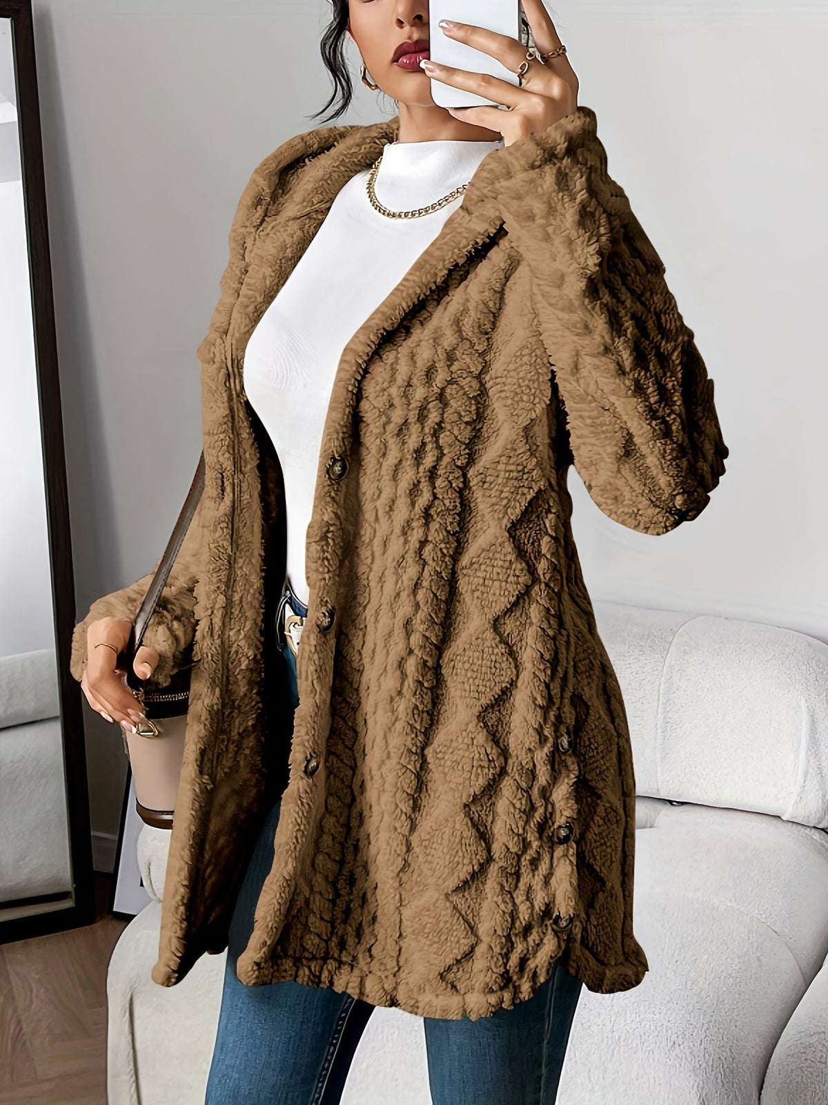 Women's hooded textured cardigan with long sleeves and button front