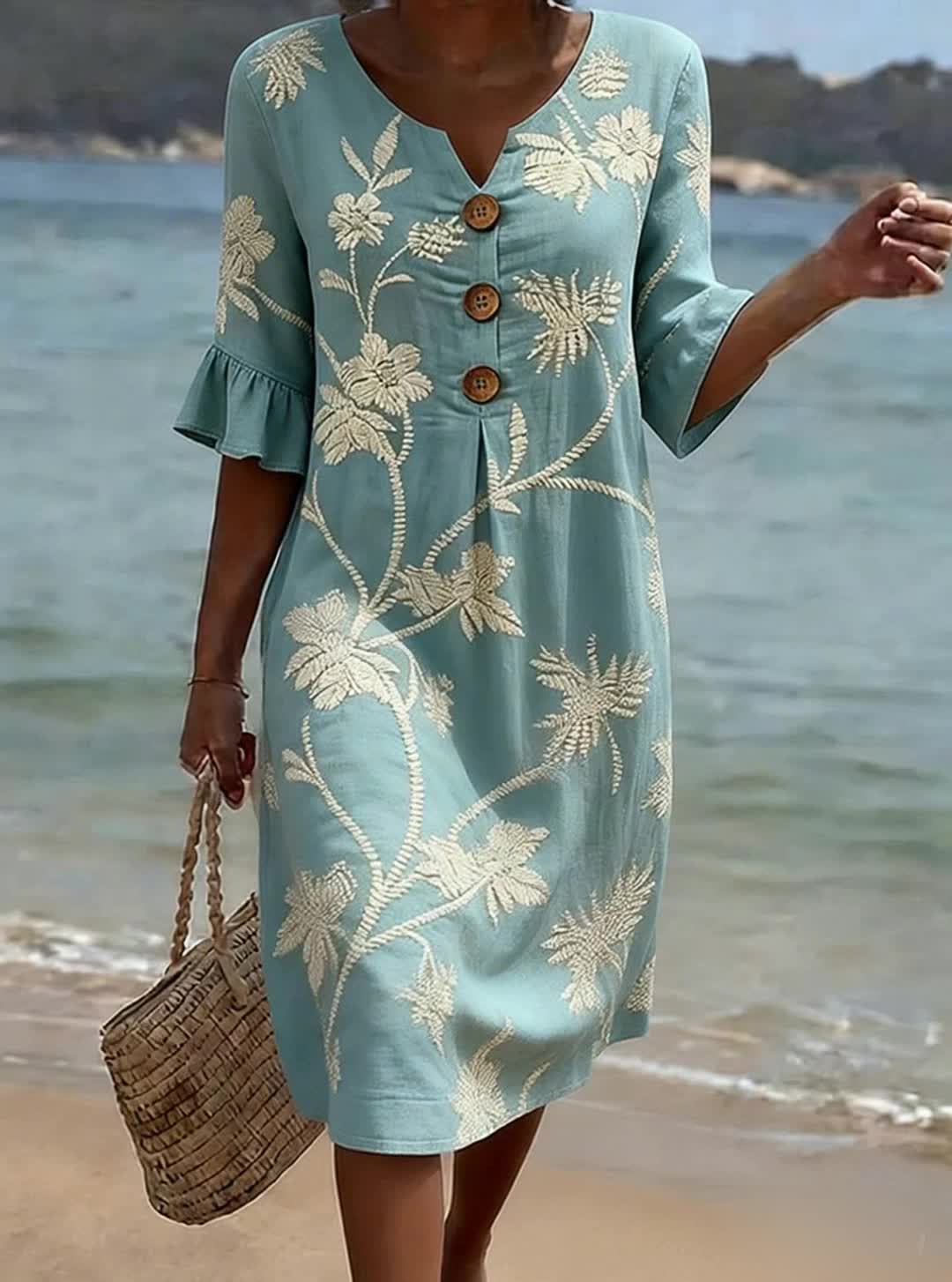 Blue floral embroidered knee-length dress with button front