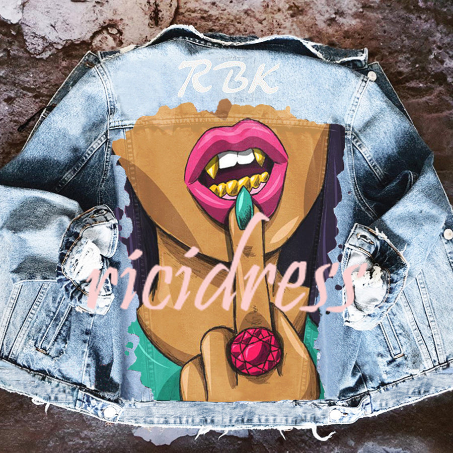 Denim jacket with colourful Halloween graphic on the back