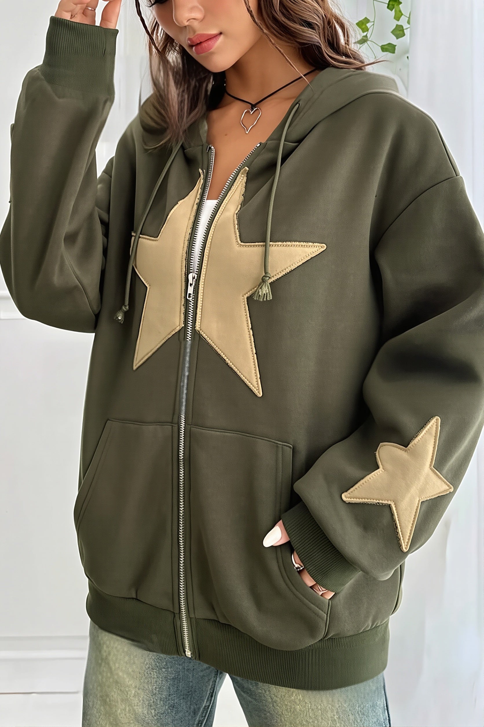 Women's oversized zip hoodie with contrasting star appliques, hood and kangaroo pockets