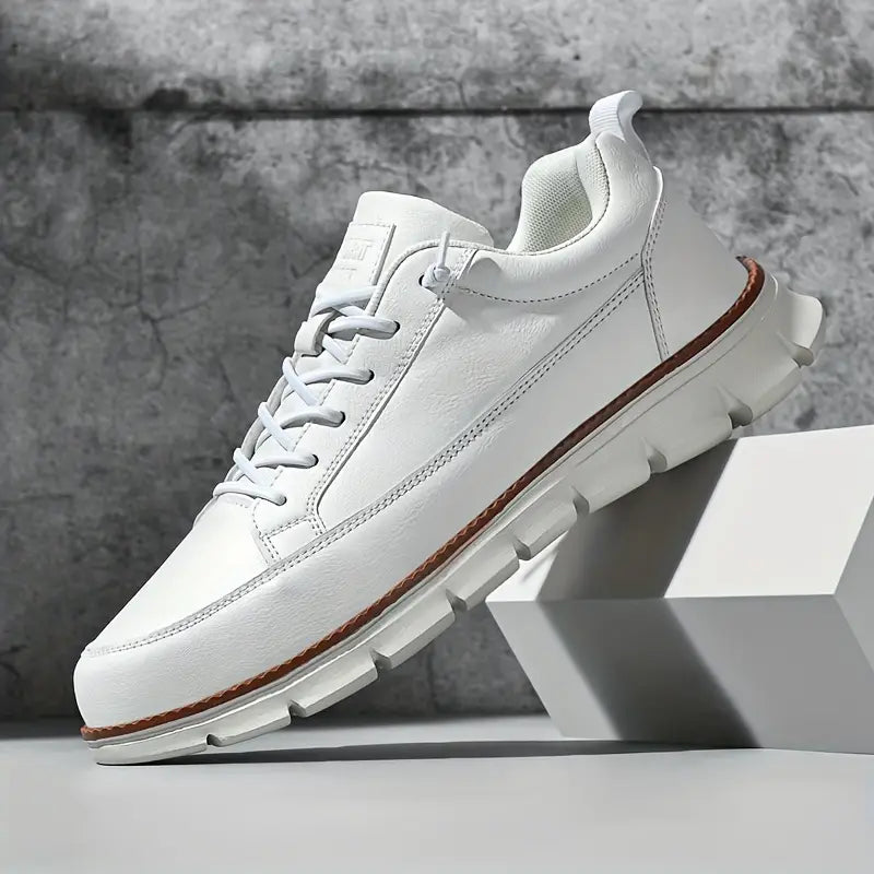 Low top lace-up sneaker with stitched panels and chunky textured sole
