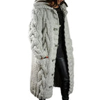 Women's longline hooded cable knit cardigan with button front