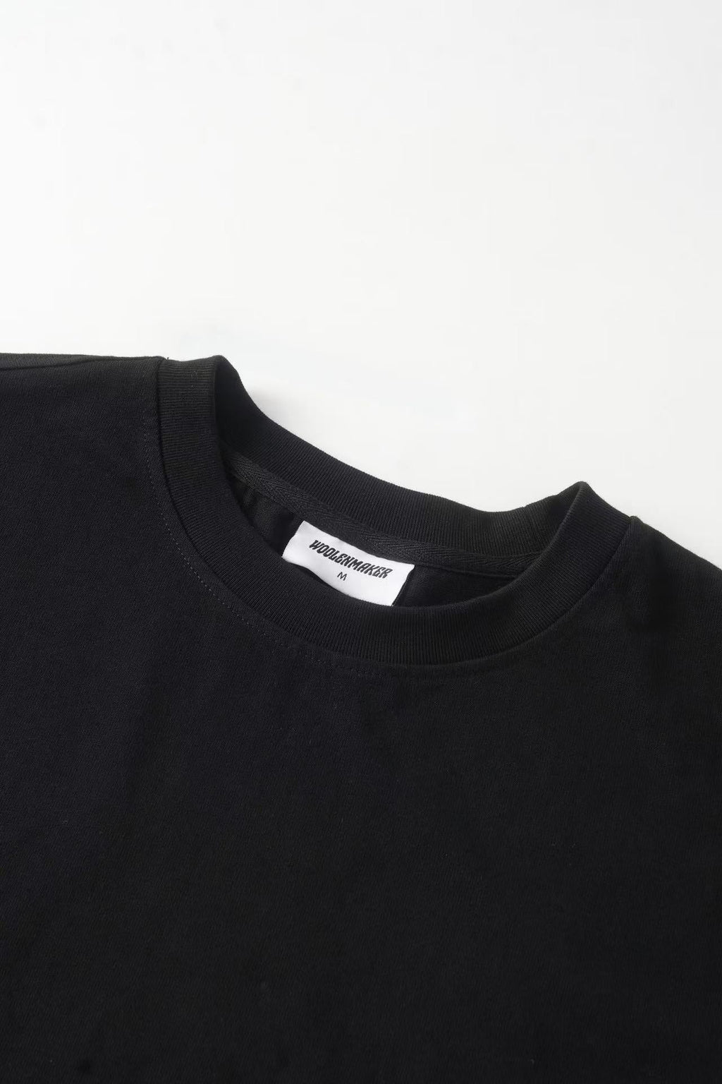 Men's black crew neck sweatshirt with white graphic sleeves