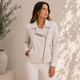 Women's notched-lapel biker jacket with angled zip and zipped pockets