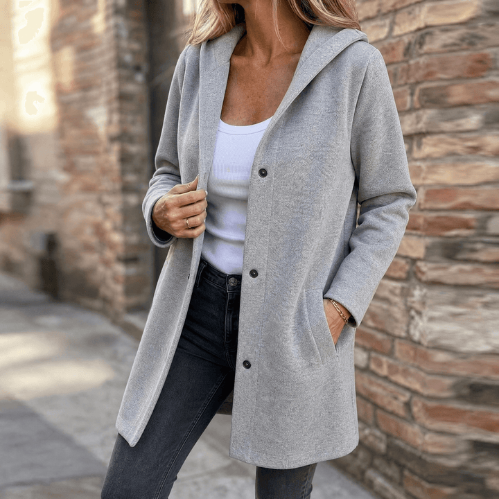 Women's longline hooded cardigan with button front and pockets