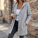 Women's longline hooded cardigan with button front and pockets