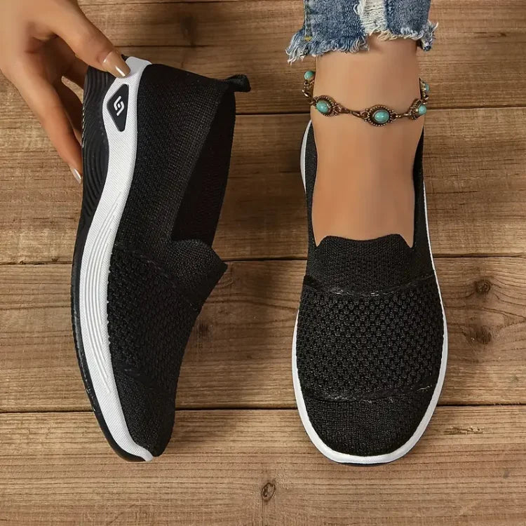 Women's knit slip-on sneakers with textured panels and white soles