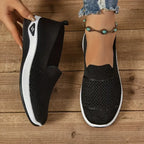 Women's knit slip-on sneakers with textured panels and white soles