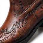 Western ankle boots with pointed toes and stitched panels