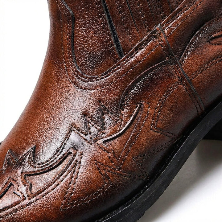 Western ankle boots with pointed toes and stitched panels